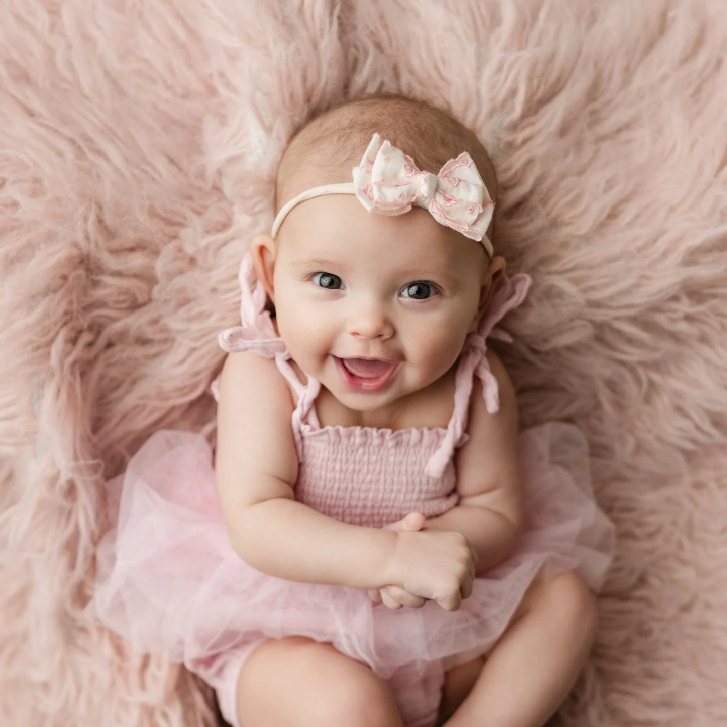 Little Miss Smiley came in for her 4 month session today 🩷