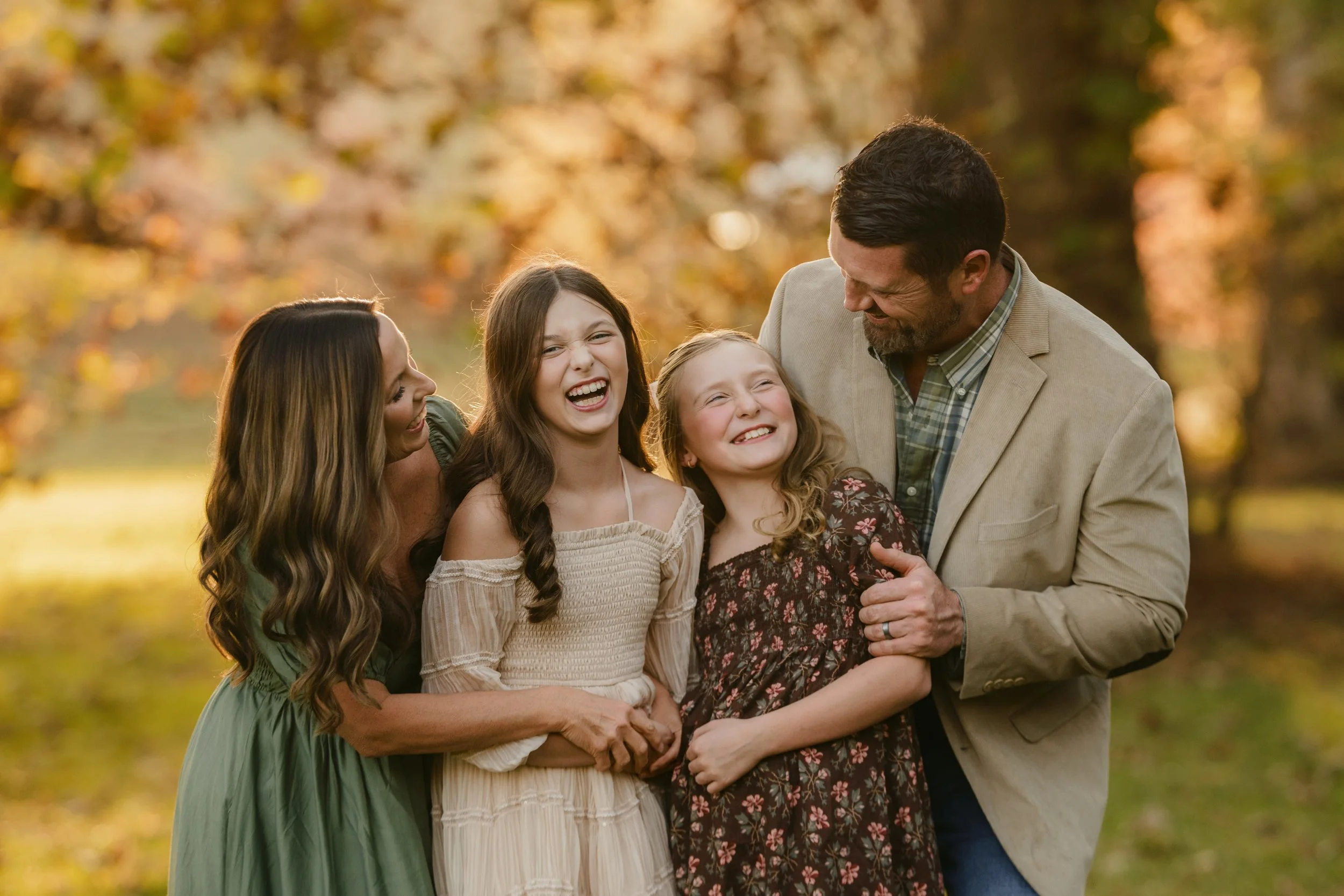 family laughing for photo in springville alabama