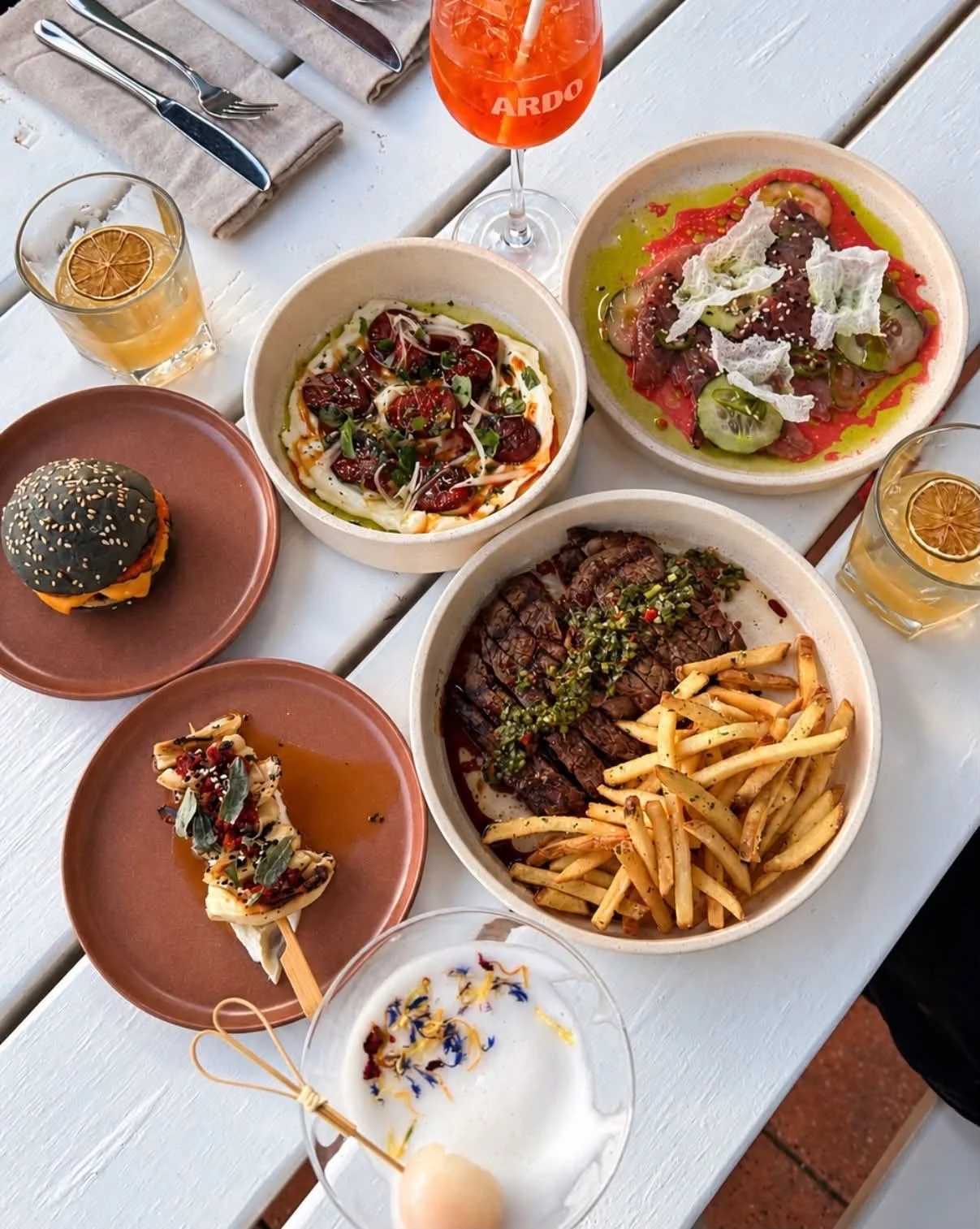 Settle in for tapas, cocktails and a good view of Main Street.