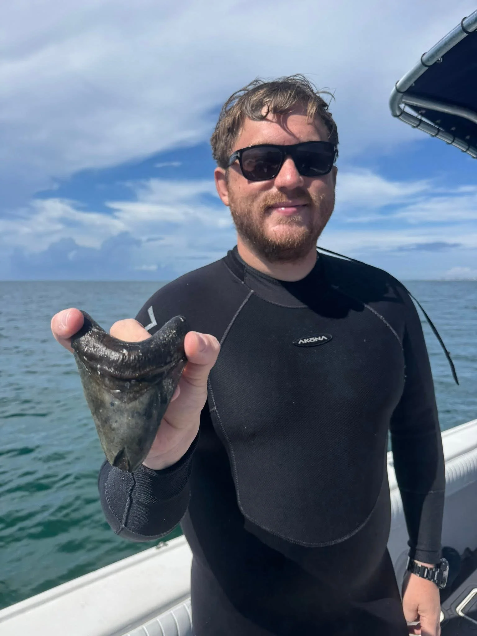Nick with his personal best tooth found on his second dive!