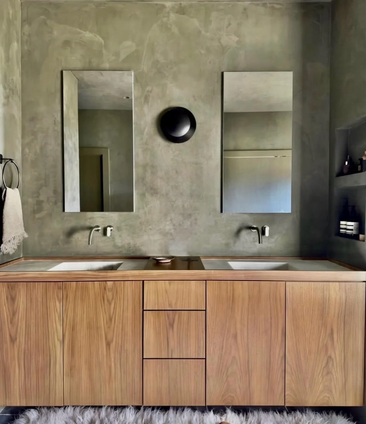 Our primary bathroom remodel

Before: bright white and efficient.
Very IKEA. Clean. Practical. 

But it never quite felt like us.

So we went moody.

Hand-troweled plaster.
Custom details. Softer light.
More texture. More depth.

We traded glossy for