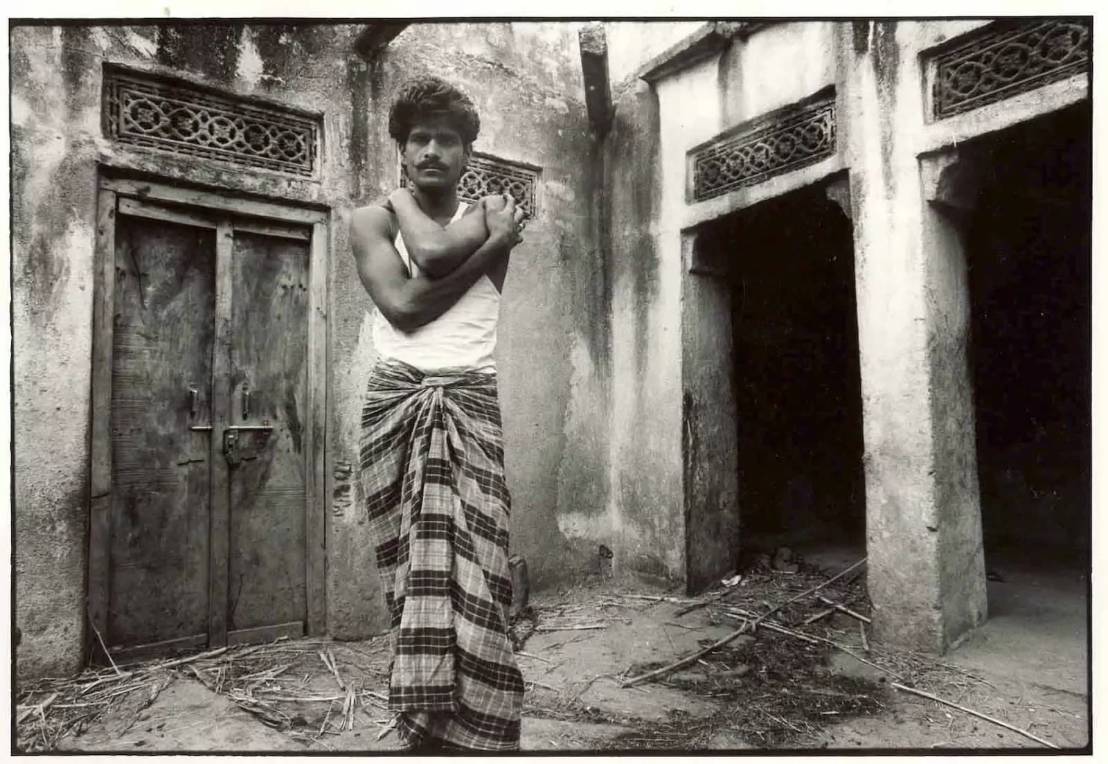 Ram-Singh-in-his-courtyard.webp
