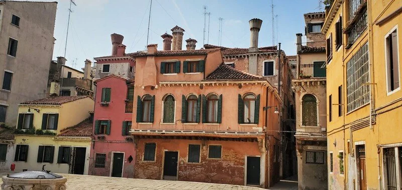 Colorful old European buildings with narrow streets.