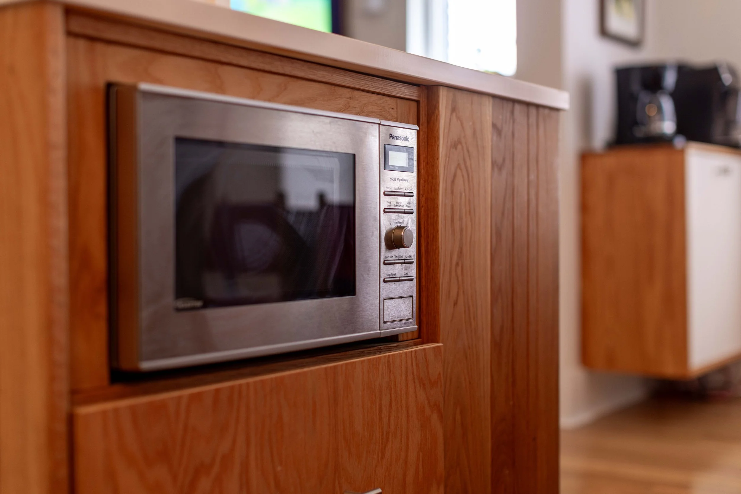 Renovated kitchen with induction cooktop — 1219 Gordon Ave furnished rental.