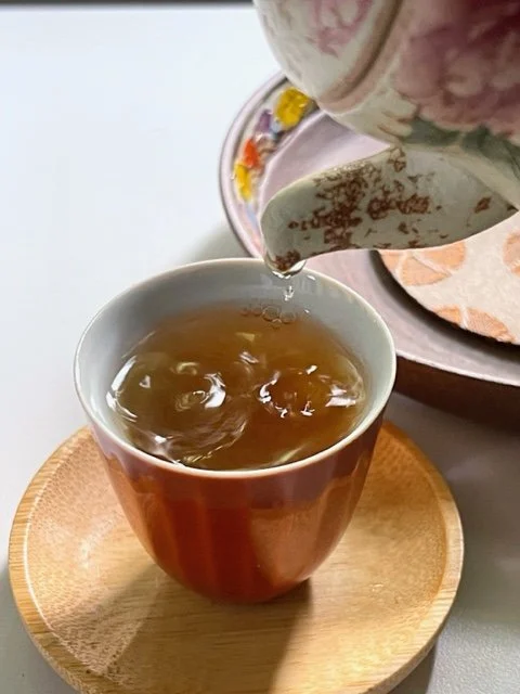 peony gourd teapot pouring water.jpg