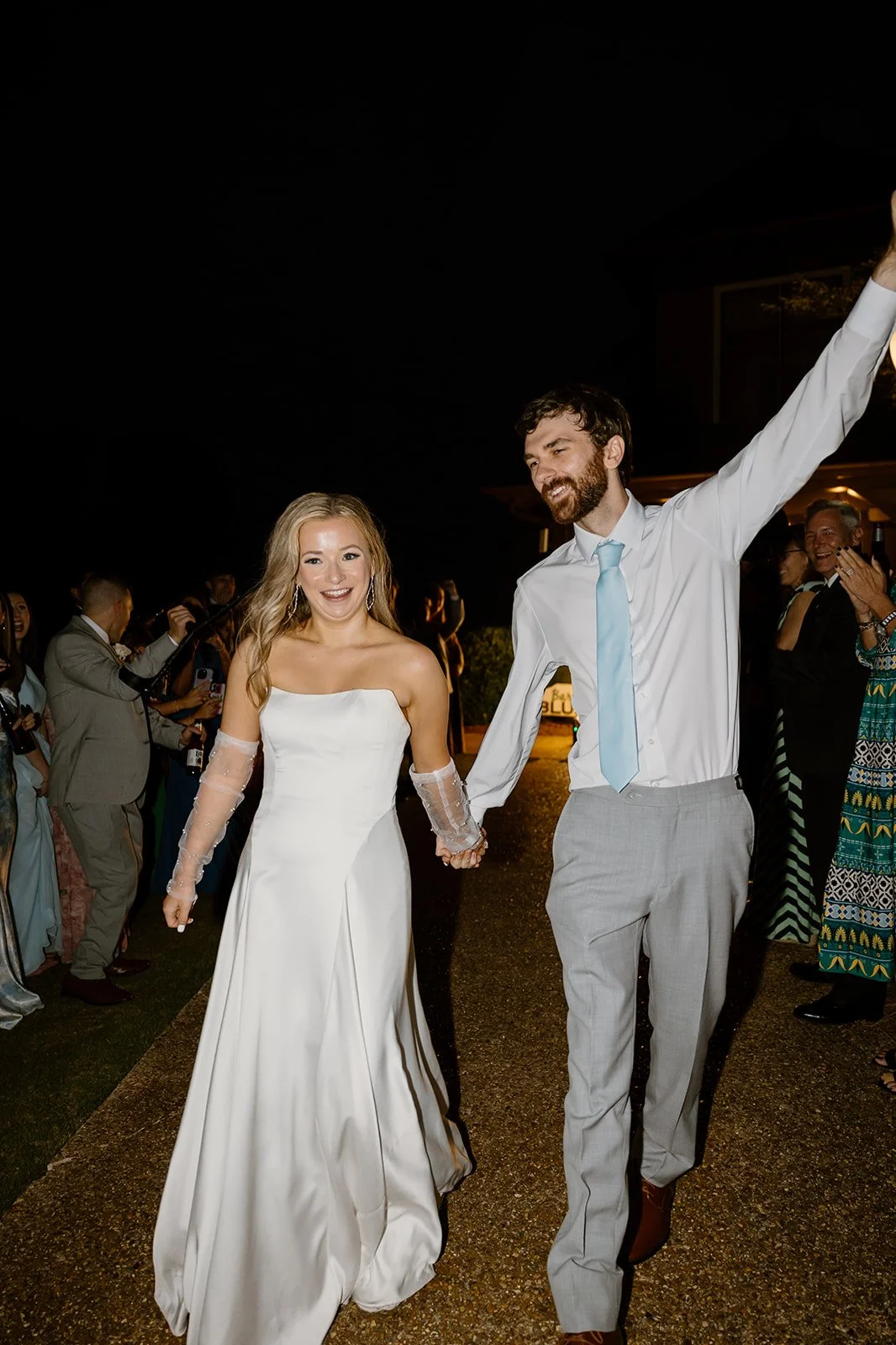 Groom celebrating on the dance floor at their Huntsville wedding reception