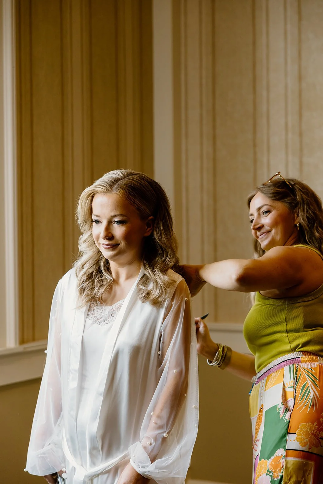 Bride getting her hair finished before her Huntsville wedding