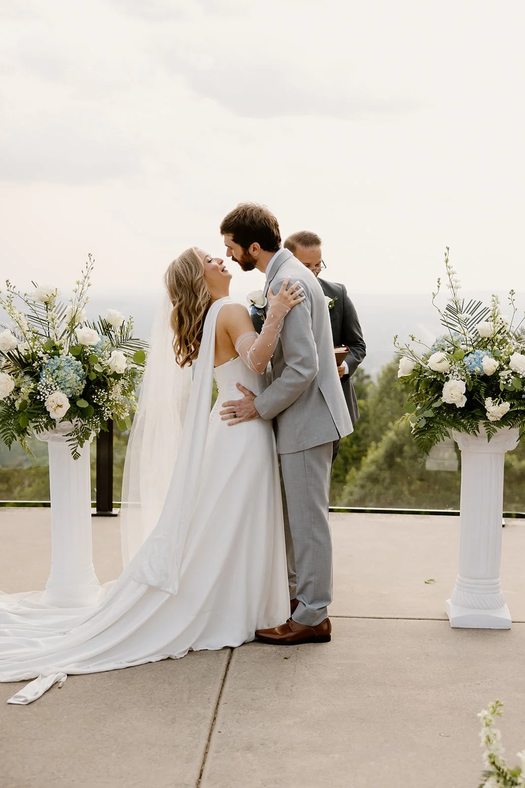 Bride and groom's first kiss at their Burritt on the Mountain ceremony in Huntsville, Alabama