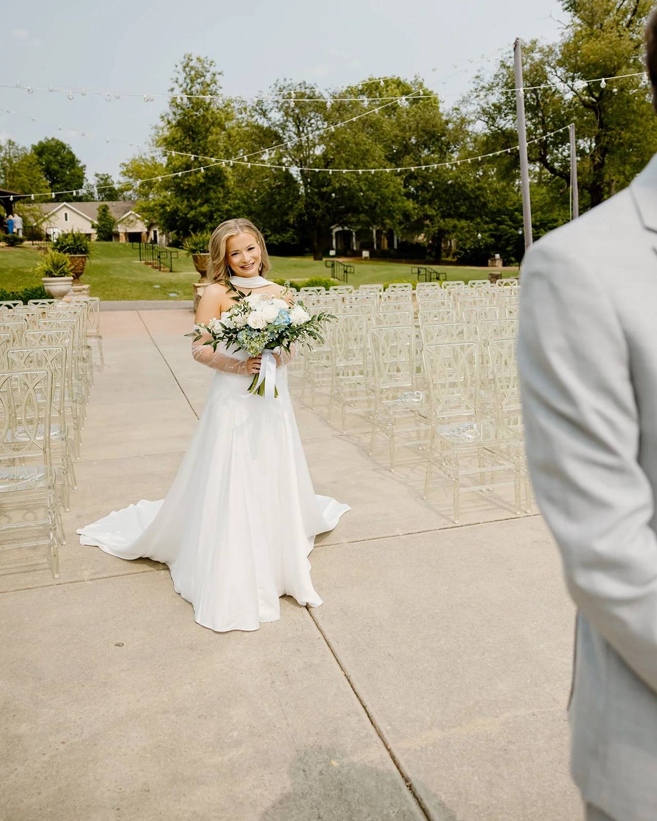 Bride walking up behind the groom for their first look at Burritt on the Mountain