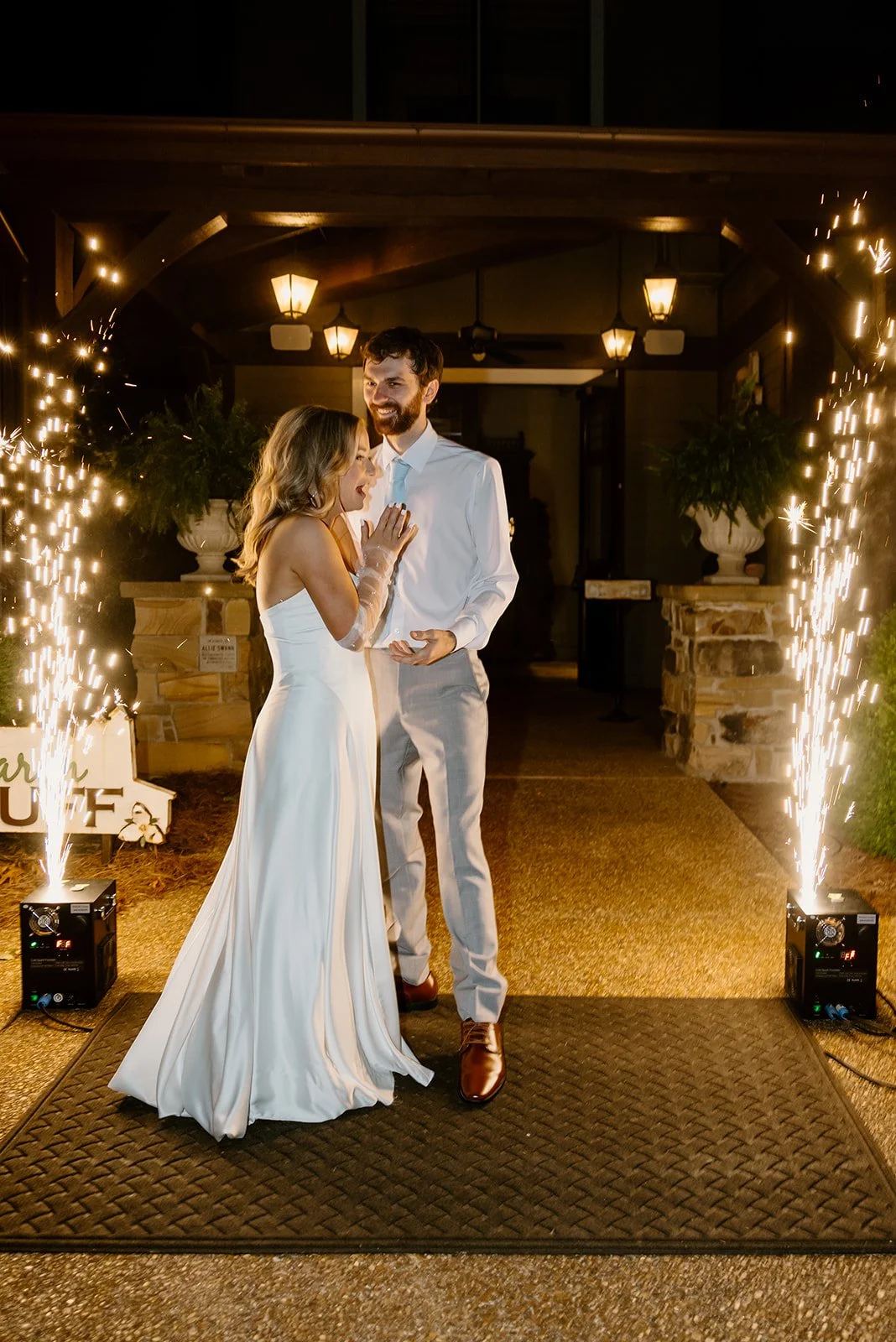 Bride and groom dancing under a spark send off at their Huntsville, Alabama wedding
