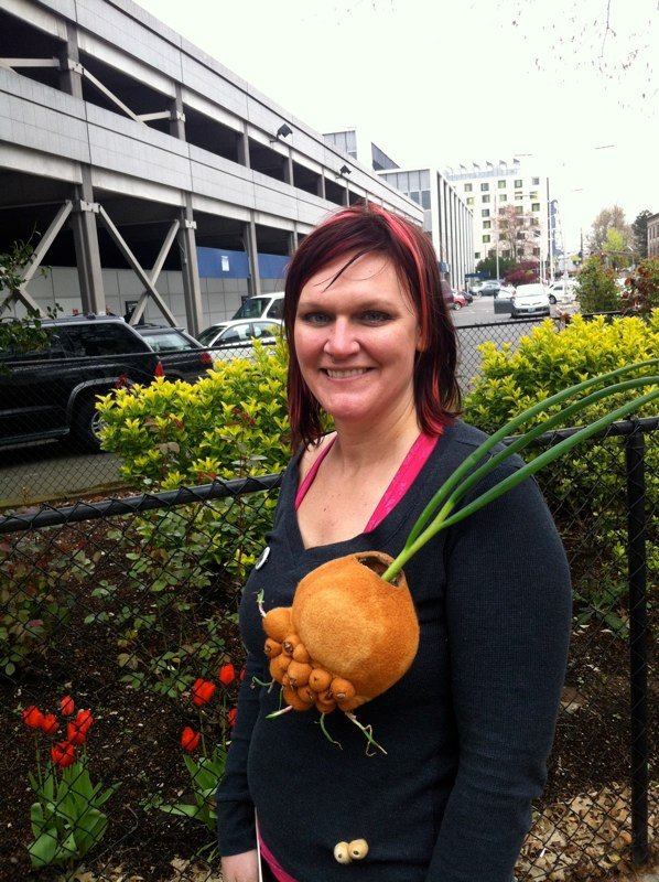Bulb Brooch
The bulb brooch is made from hand felted and sculpted merino wool dyed with onion skins. It held an Egyptian Walking Onion plant who's seeds were passed down in my family through generations, beginning with my late grandfather who began g