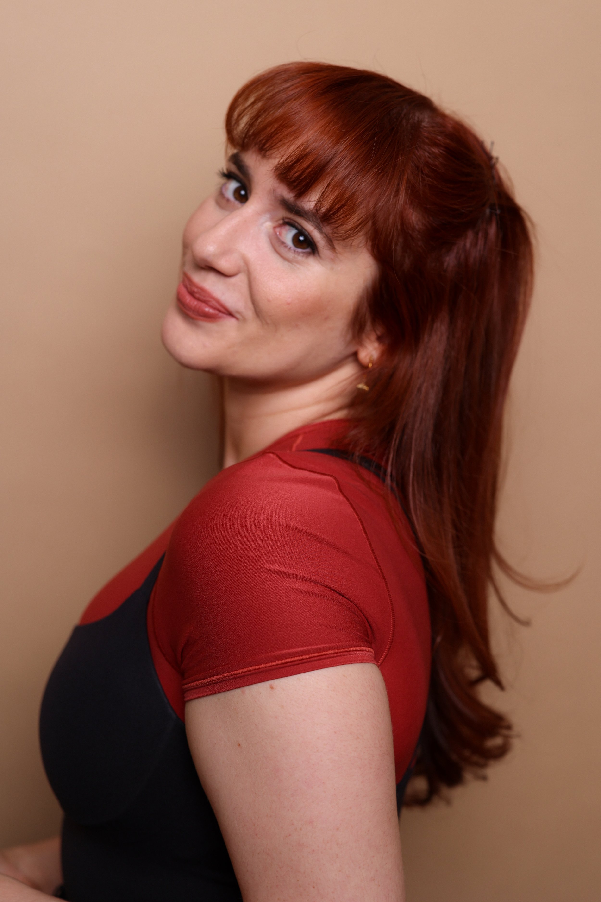 Red Serious HeadshotM4A8817.jpg