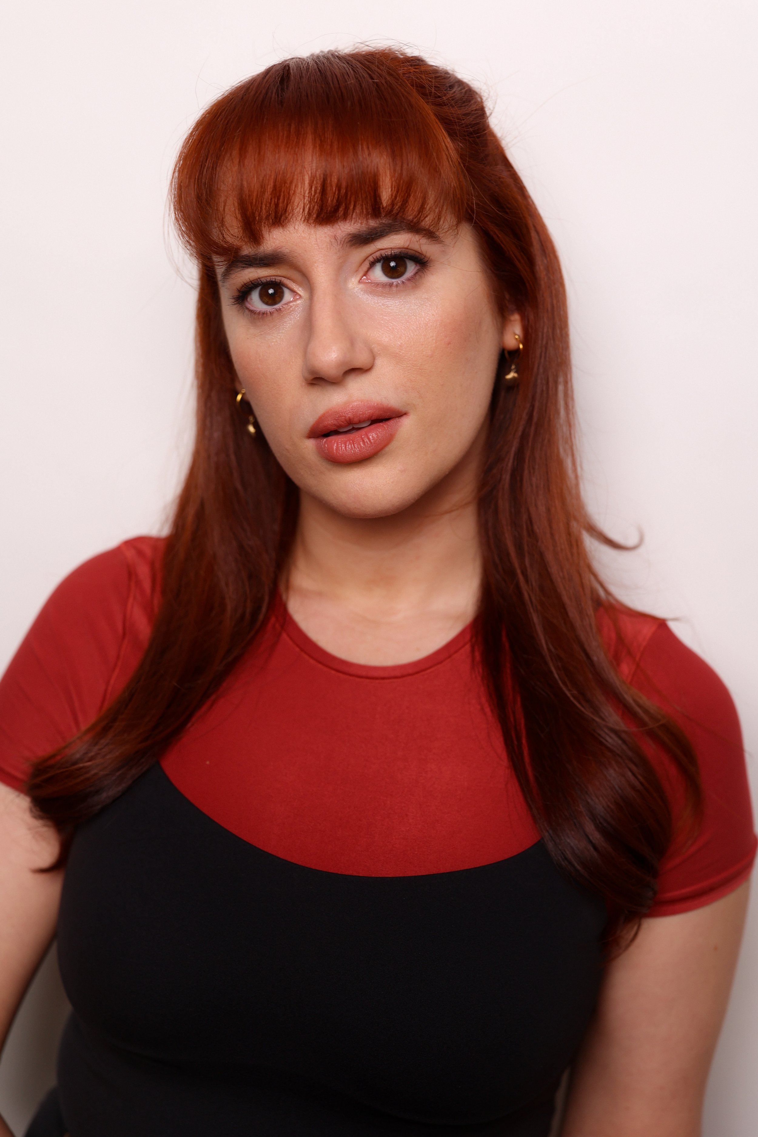 Red Serious HeadshotM4A8564.jpg
