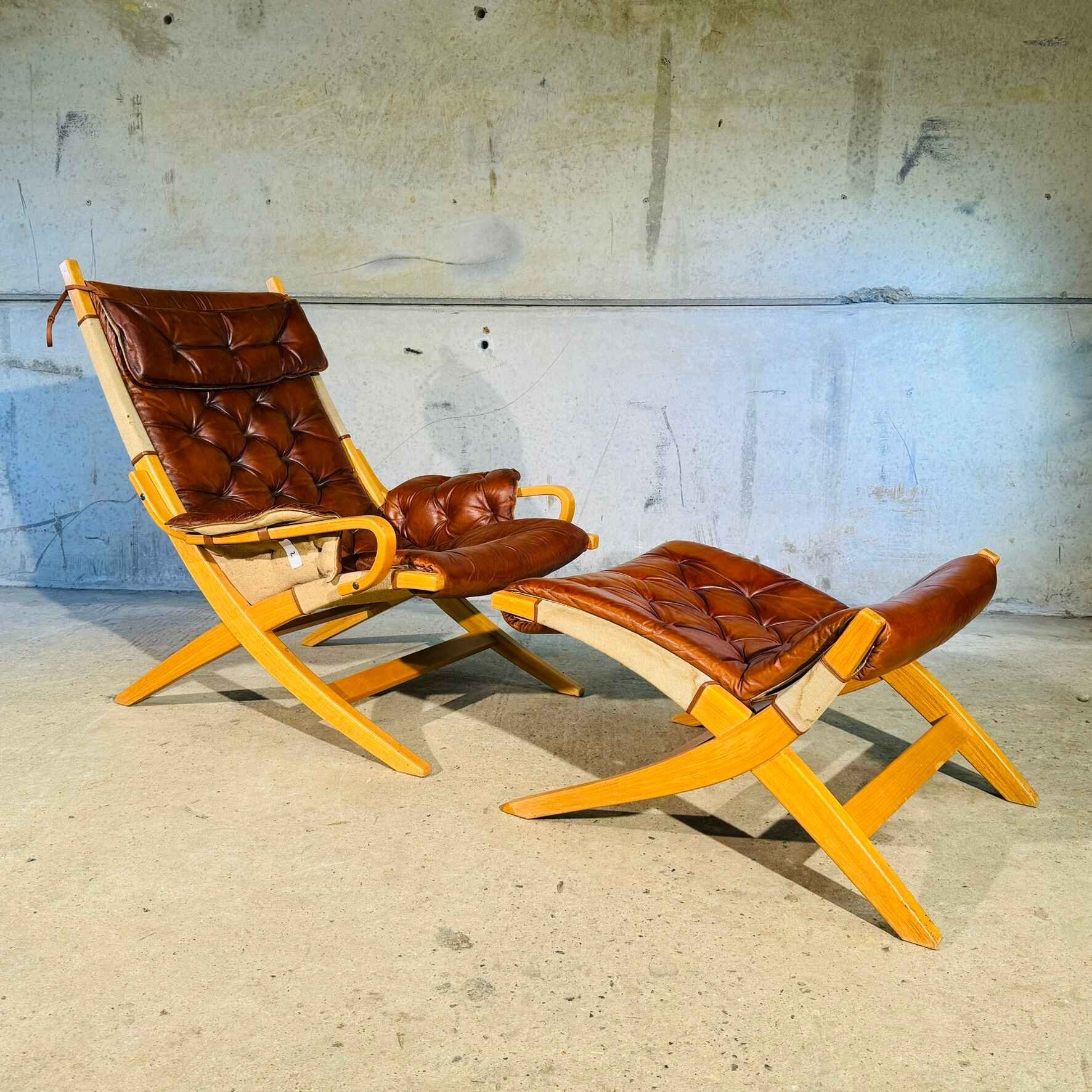 Stylish Swedish 70s Tan Leather And Canvas Armchair and Footstool.jpeg