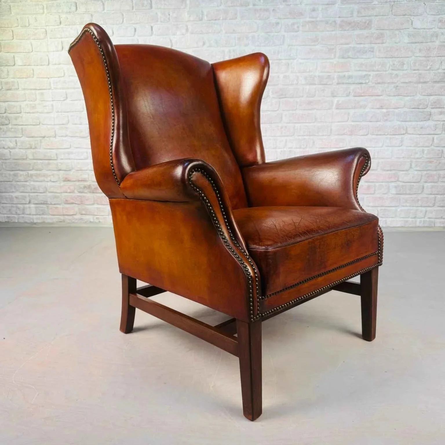 Vintage+English+Tan+Leather+Wingback+Chair.jpg