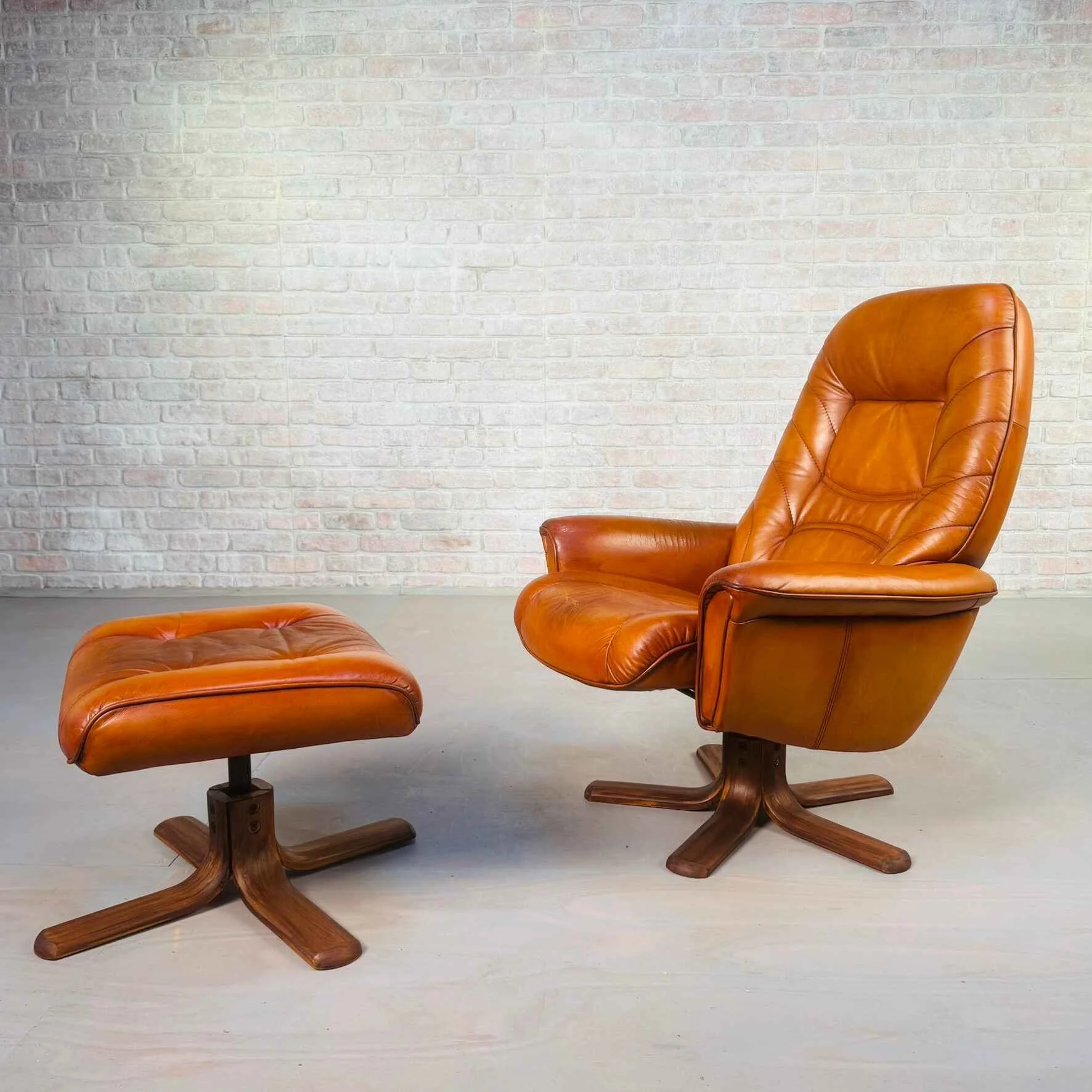 Vintage Danish Tan Leather Reclining Swivel Chair & Footstool by Skalma.jpeg