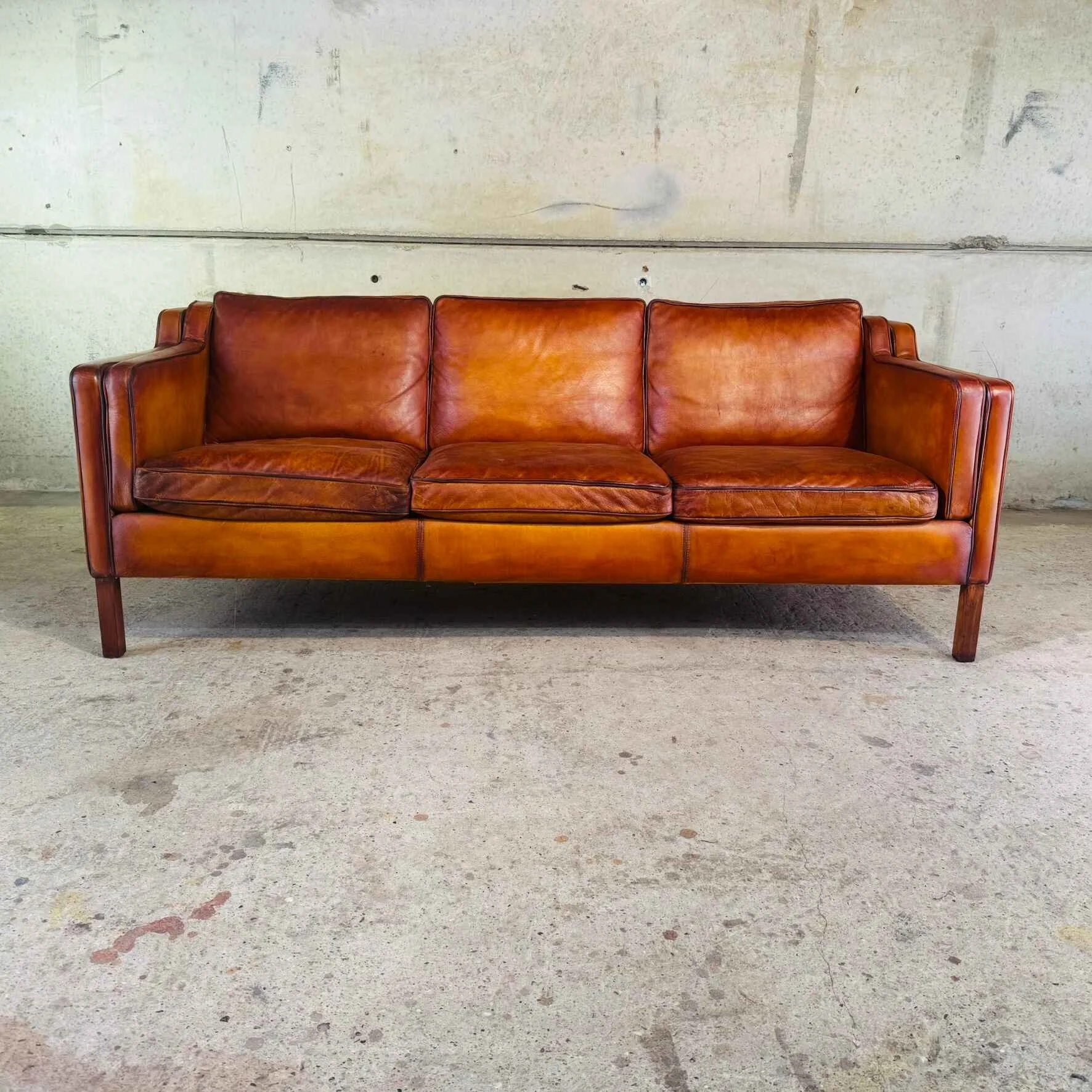 Vintage Danish 1970s Stouby Three-Seater Cognac Leather Sofa.jpeg