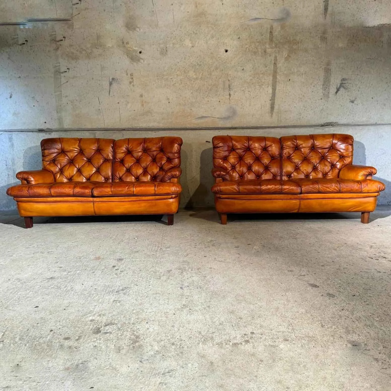 Pair of Two Seater “Jupiter Chesterfield Sofas Arne Norell Sweden.jpg