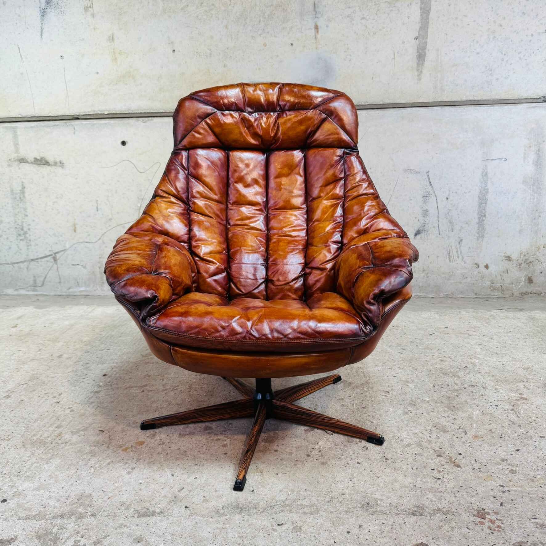 1960s Danish Tan Leather Egg Swivel Chair by Henry J Klein for Bramin (2).jpeg