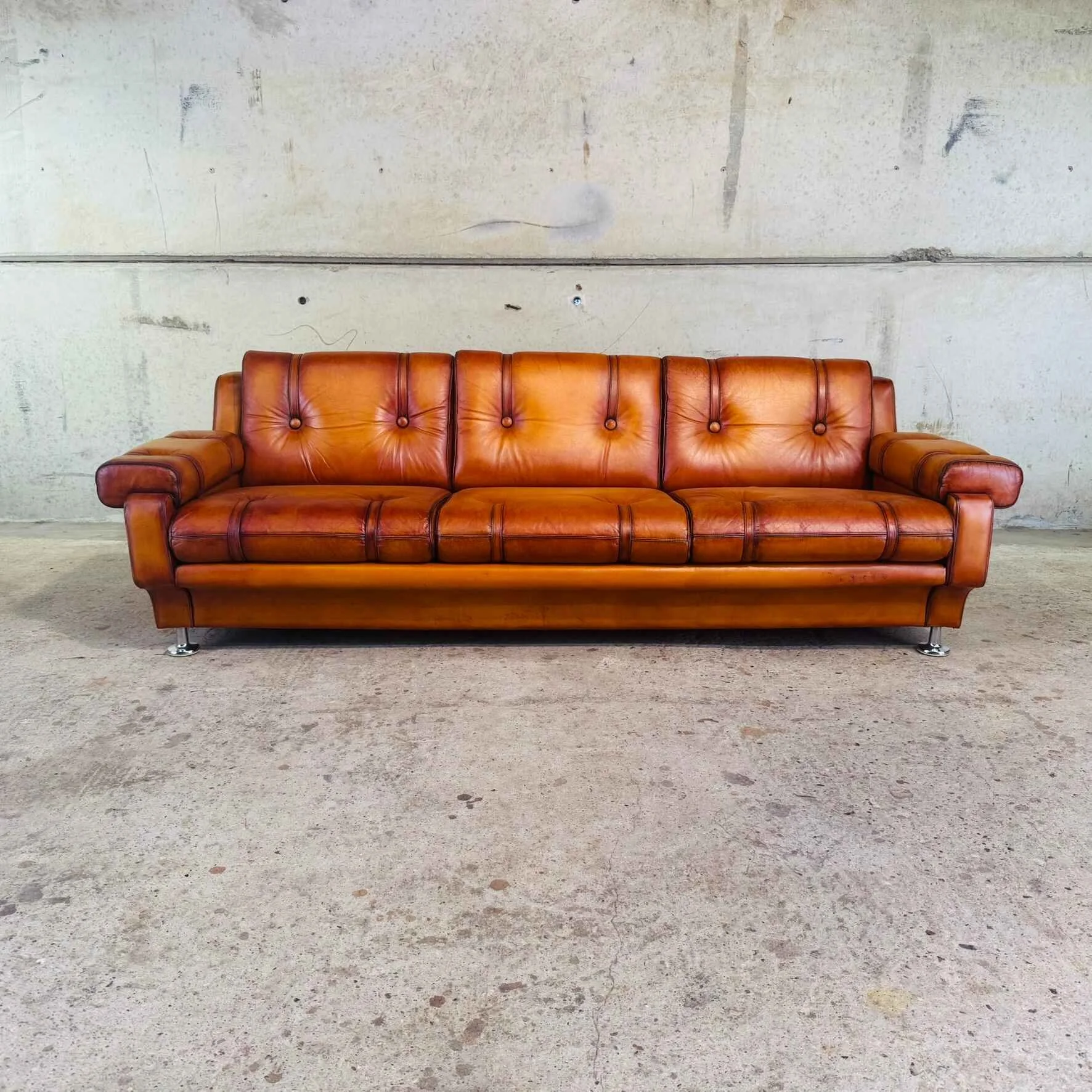 Vintage Danish Three-Seater Cognac Leather Sofa.jpeg