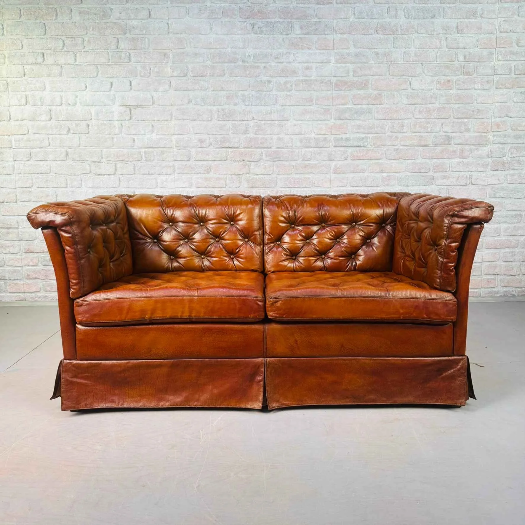 Vintage Danish Tan Leather Two Seater Sofa Fully Buttoned.jpeg