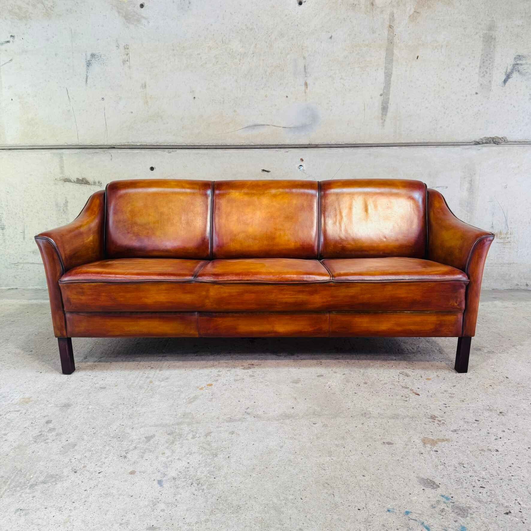 Elegant 1970s Danish Three-Seater Tan Leather Sofa – Curved Arms.jpeg