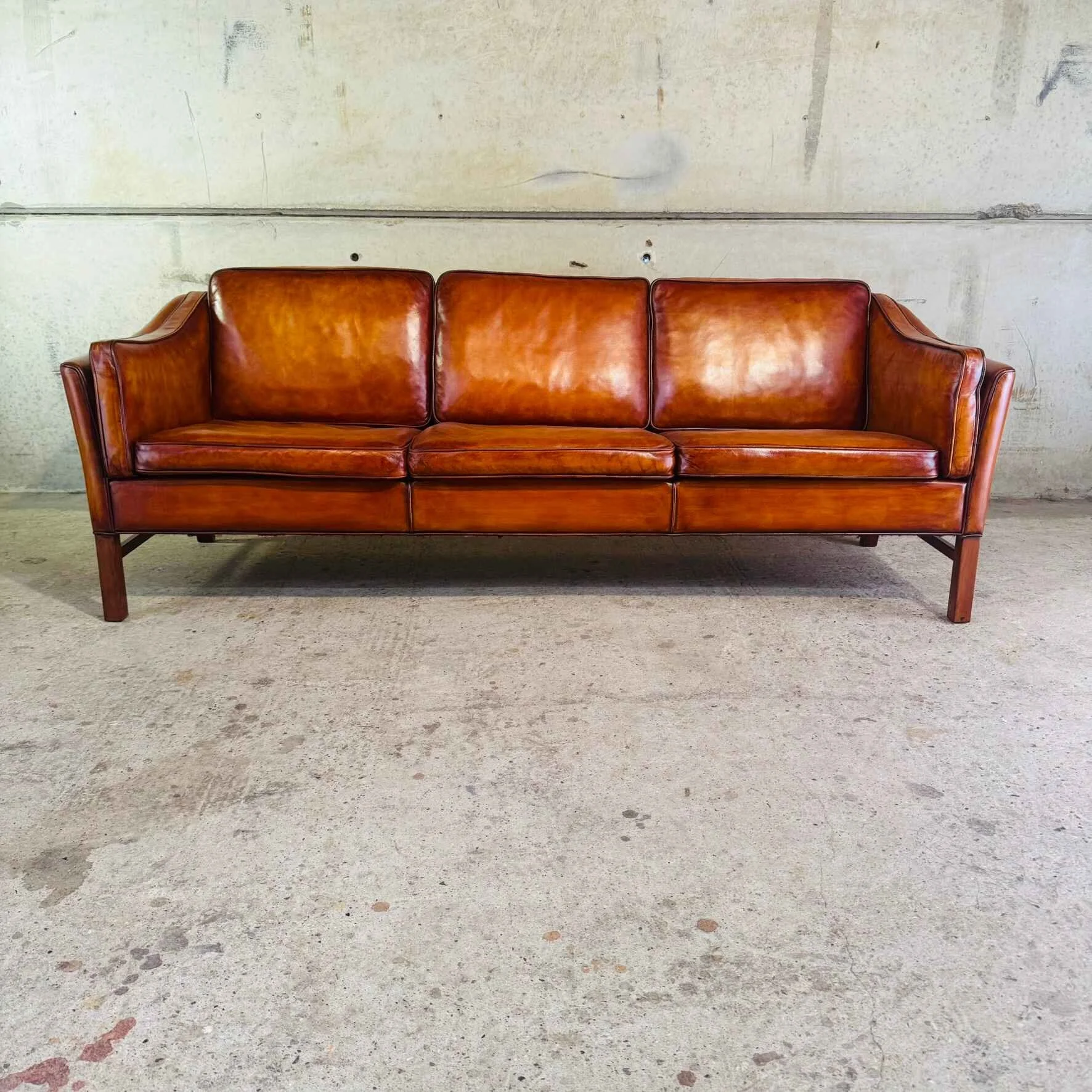 Long Vintage Danish Cognac Leather Three-Seater Sofa – Durable & Stylish.jpeg
