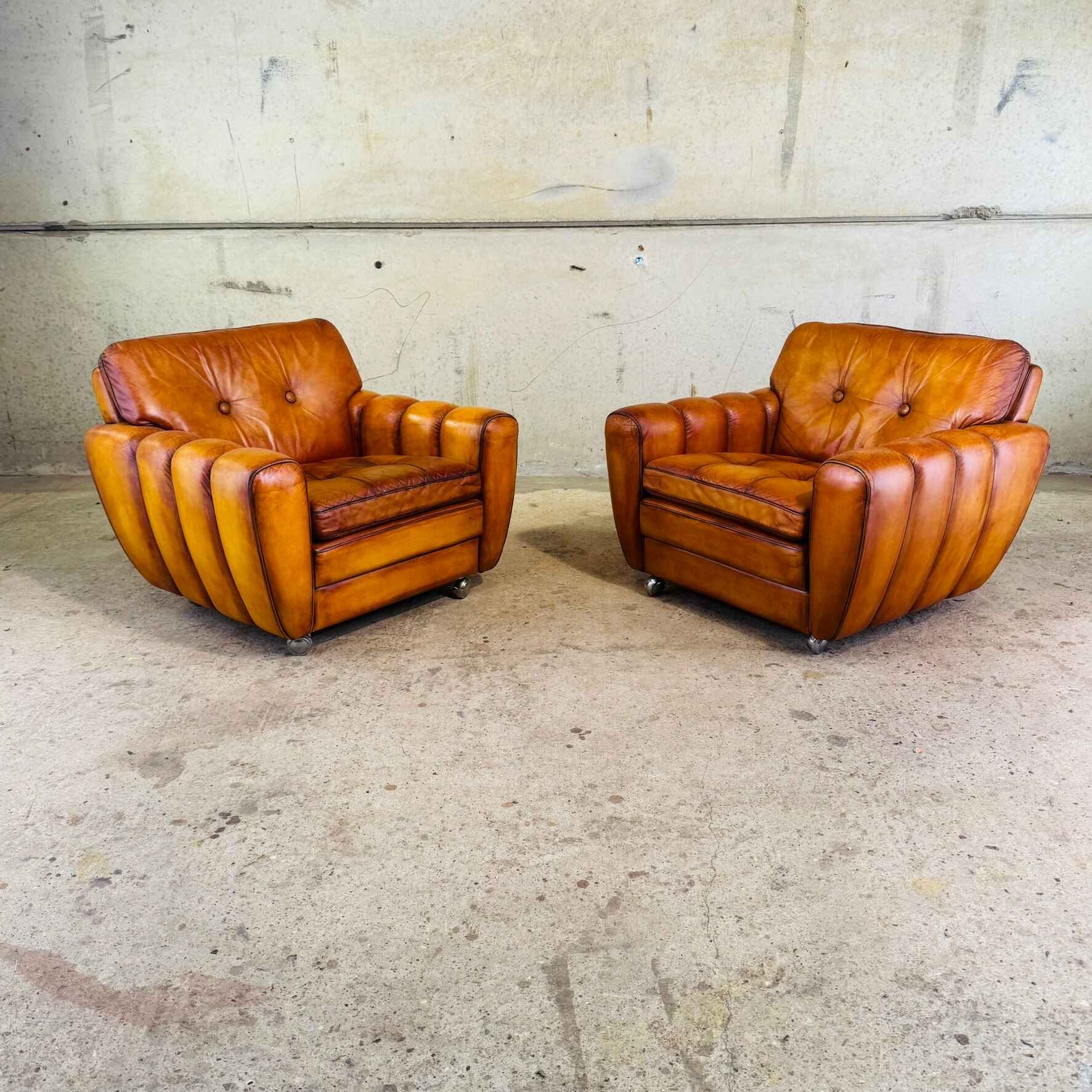 Pair of 1970s Danish Light Tan Leather Armchairs by Svend Skipper.jpeg