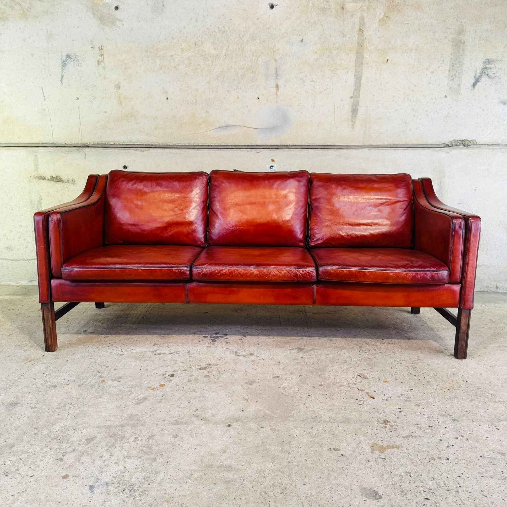Elegant 1970s Danish Three-Seater Cognac Leather Sofa by Skippers Møbler.jpeg