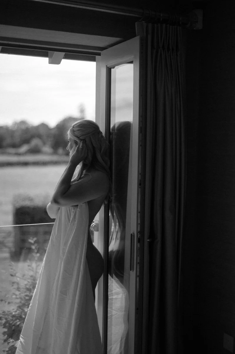  Bride-to-be posing during her bridal boudoir session in Hampshire before her wedding day. 