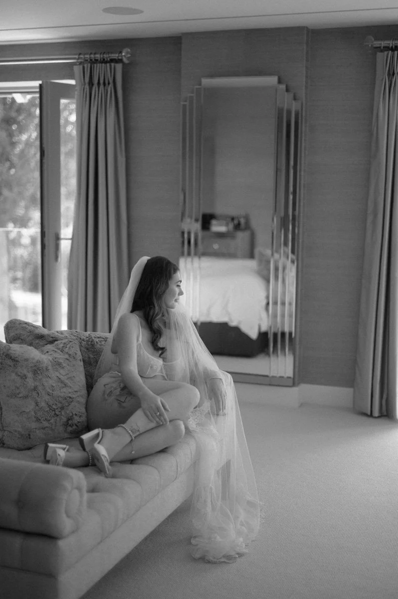  Bride-to-be during a luxury bridal boudoir photoshoot in Hampshire before her destination wedding in Thailand. 
