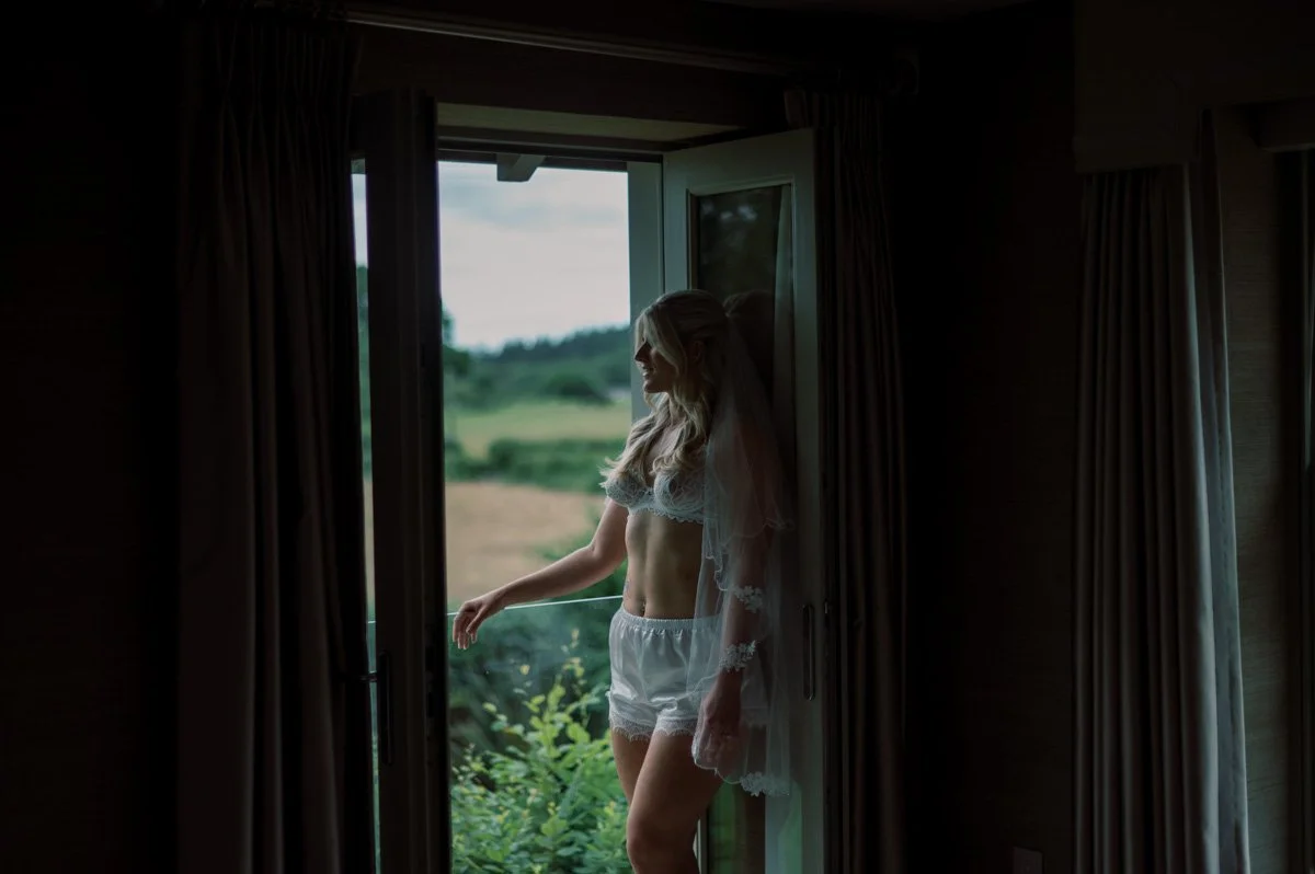 How to Choose the Right Boudoir Photographer (Even If They're Not the Closest)