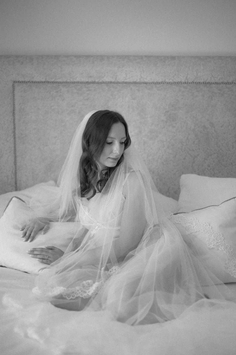 bride-wearing-veil-boudoir-session-hampshire.jpg