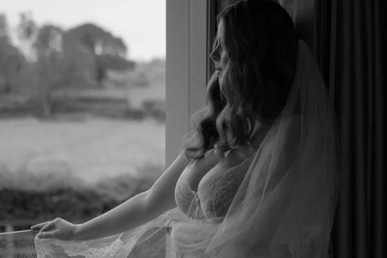 Bride during a bridal boudoir photoshoot in Hampshire, demonstrating that confidence grows through the experience rather than being something women need before their session.