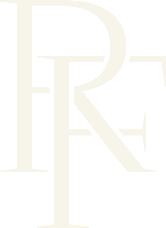 Close-up of a black background with a large, stylized white letter 'R' and other abstract design elements.