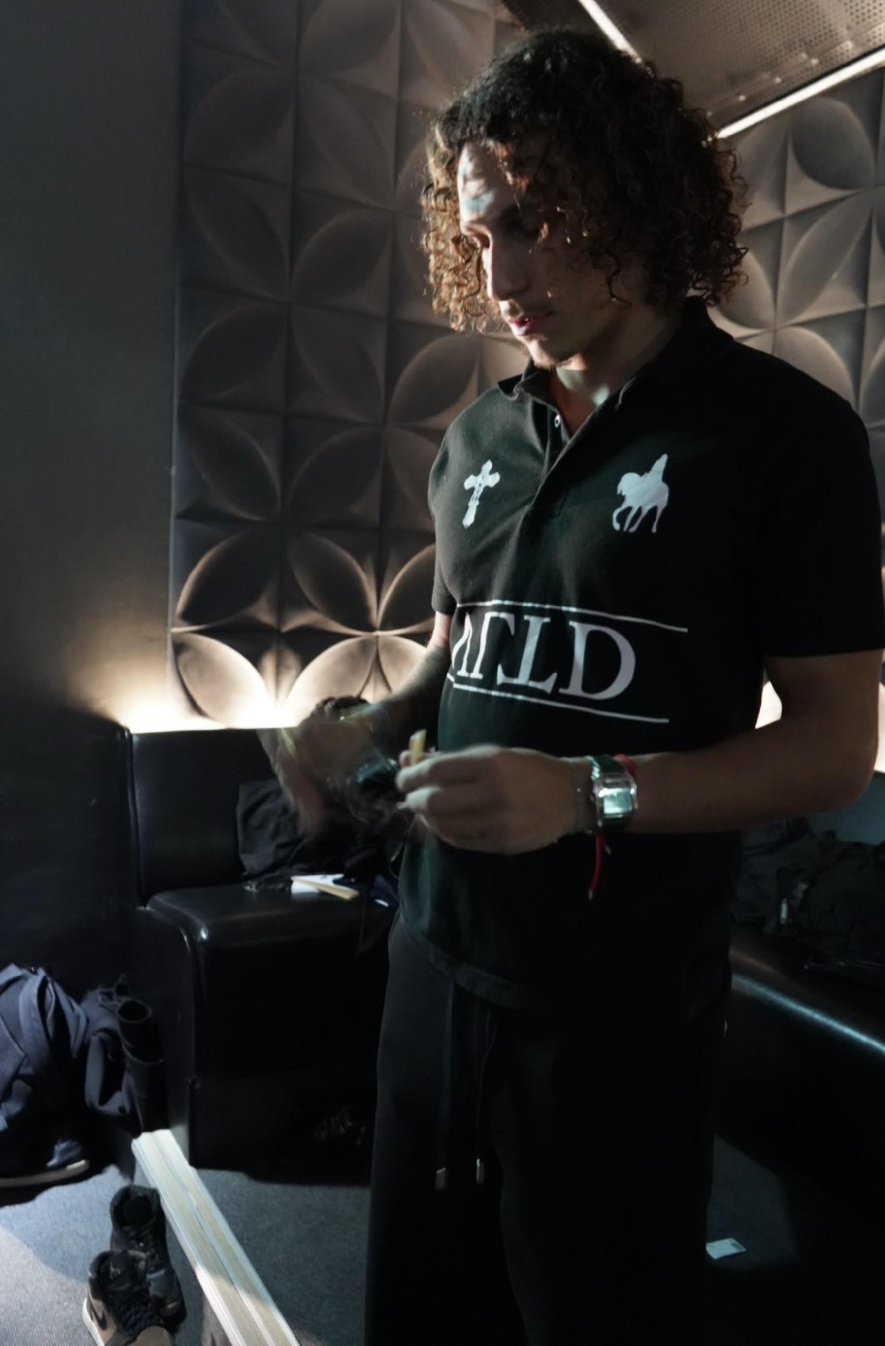 TAYZO is an artist carving out his own lane where early-2000s R&B smoothness meets the dark, immersive energy of modern trap. Blending melodic vocals with hypnotic production, his sound feels both familiar and futuristic like the emotional honesty of