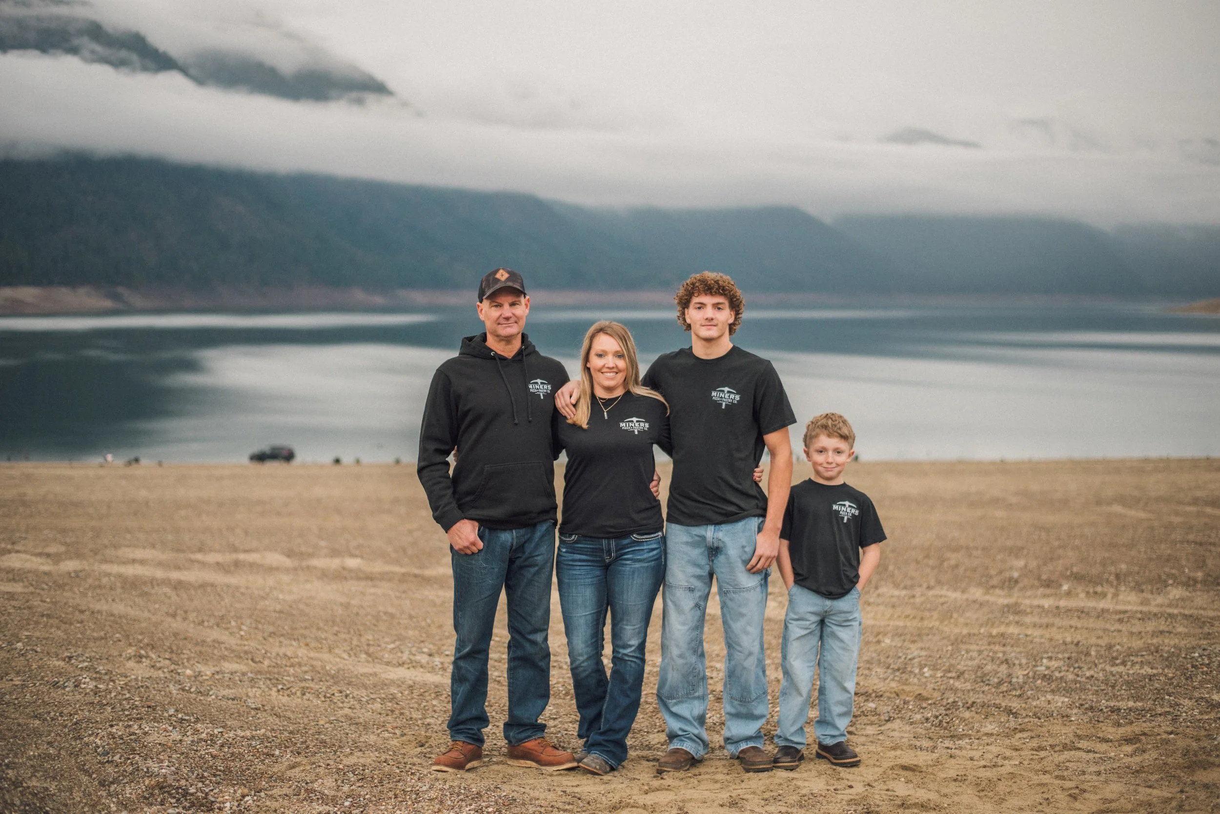 Owners family of four photo on beach in Cle Elum, WA
