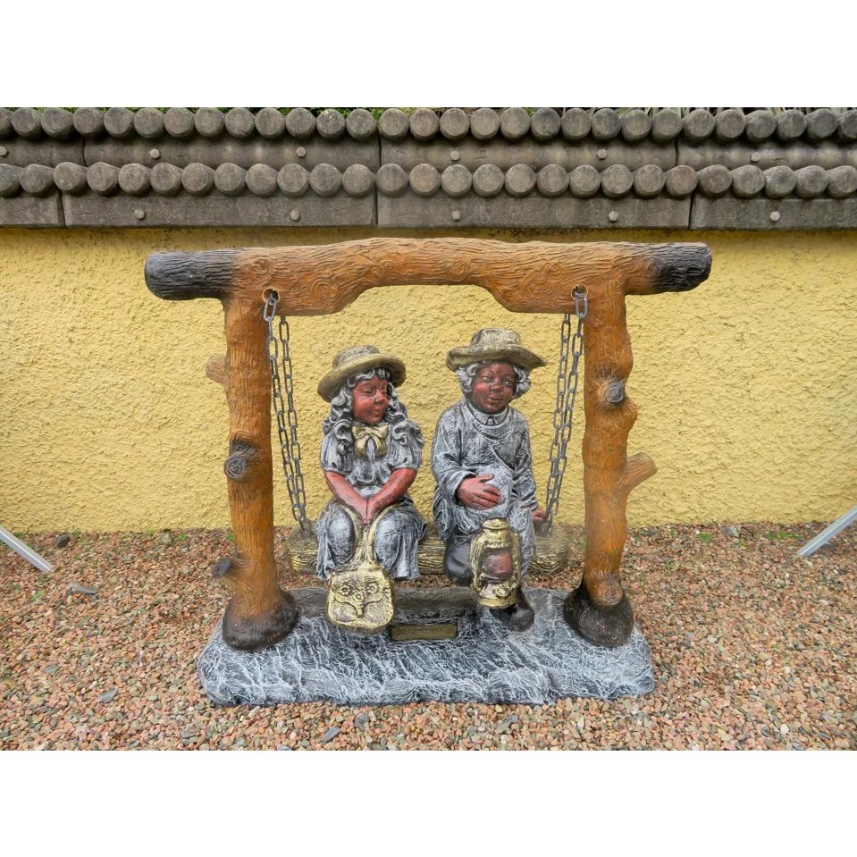 Boy & Girl On Rustic Swing
