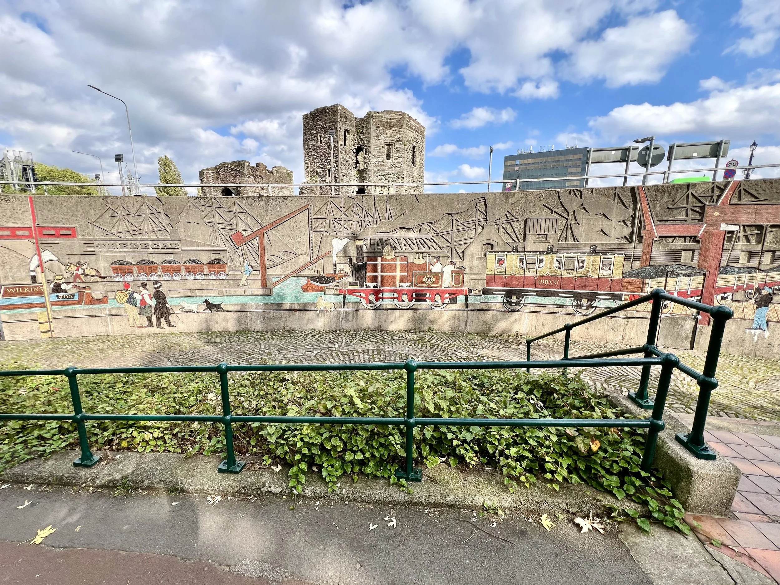 Mural and Newport Castle just before the bridge over The River Usk