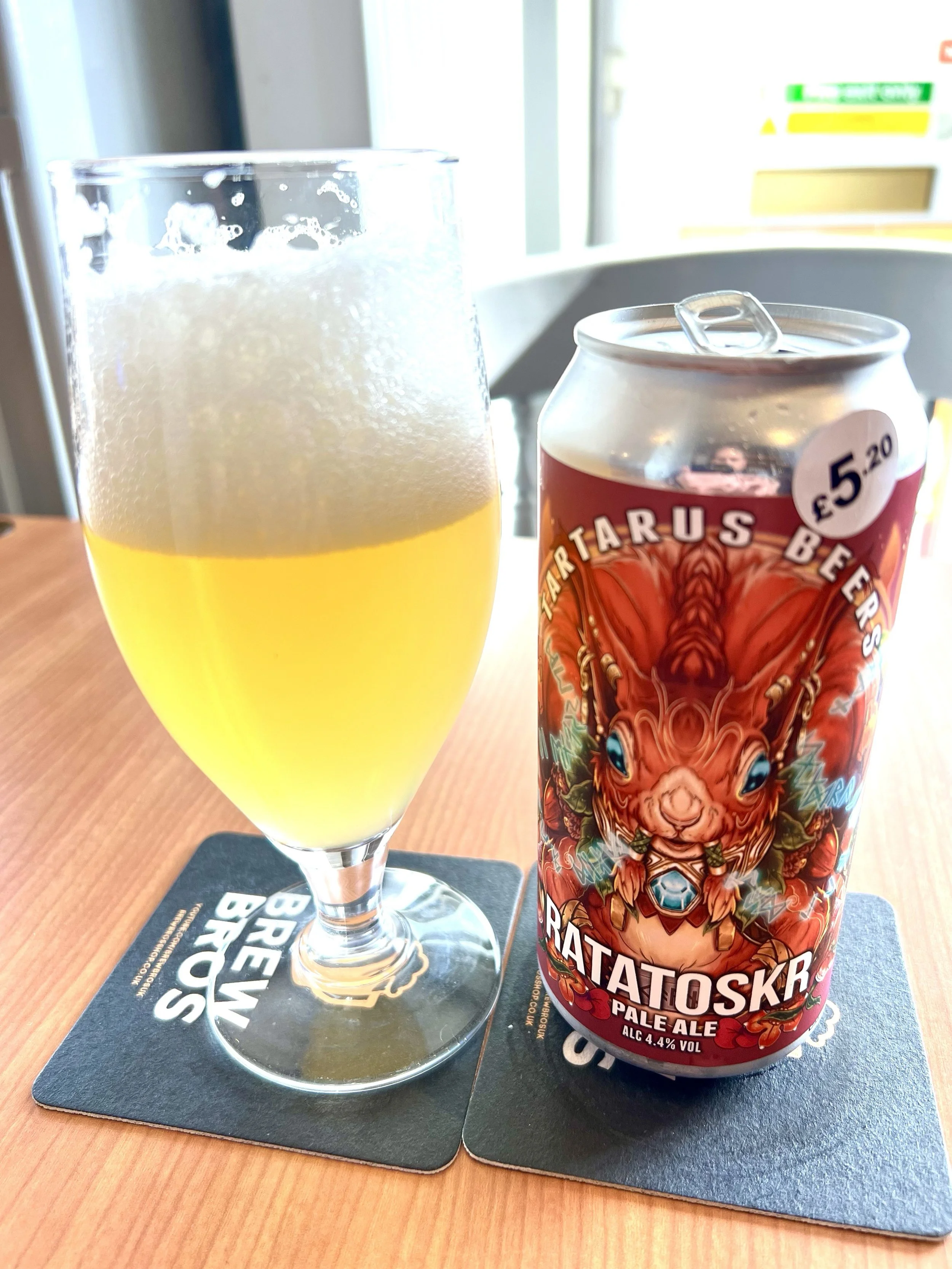 A poured can of Ratatoskr - Tartarus Beers