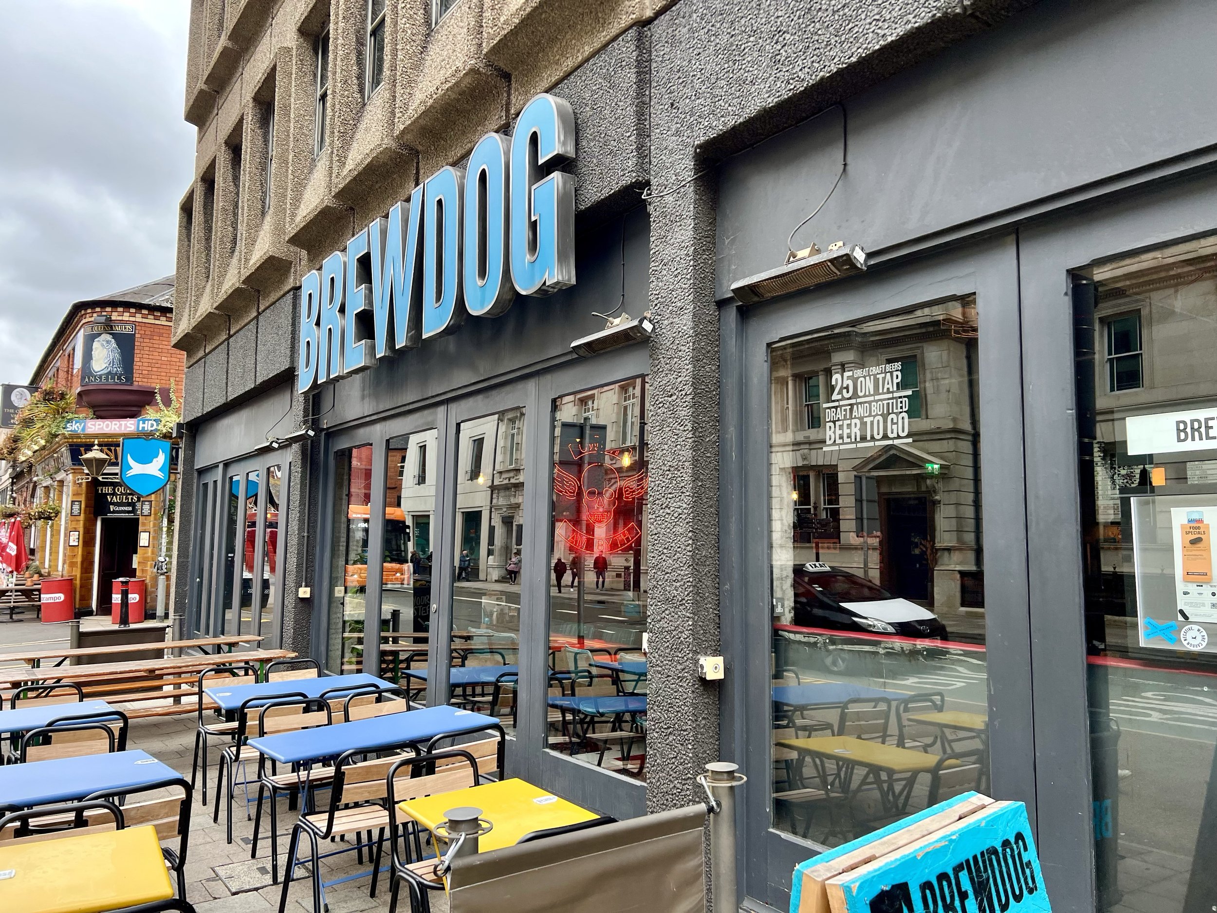 BrewDog Cardiff with the Queens Vaults behind it.