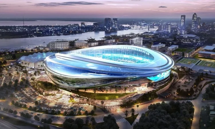 A rendering of a futuristic sports stadium in a city