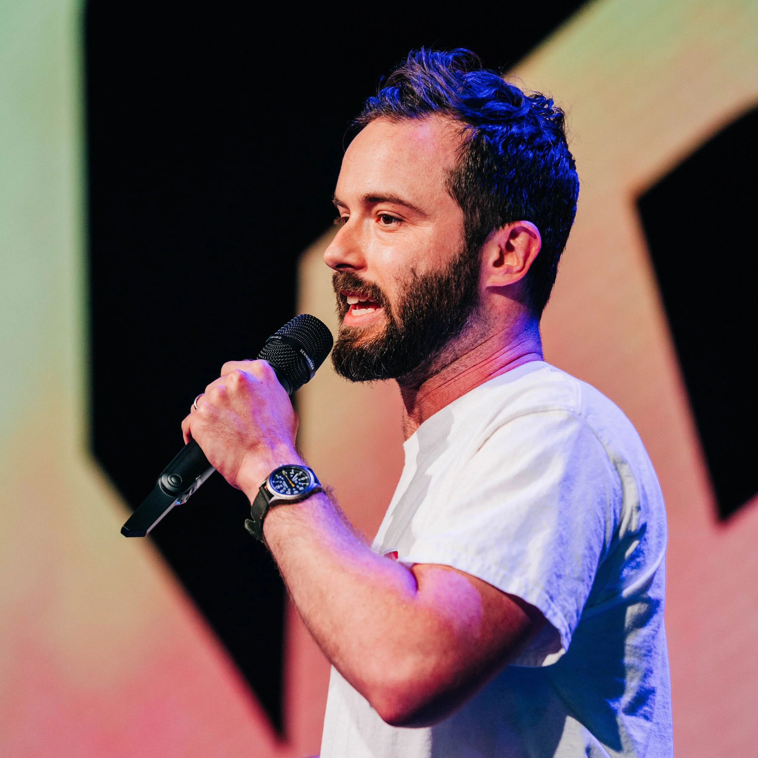 Lawrence Grey speaking at an event.