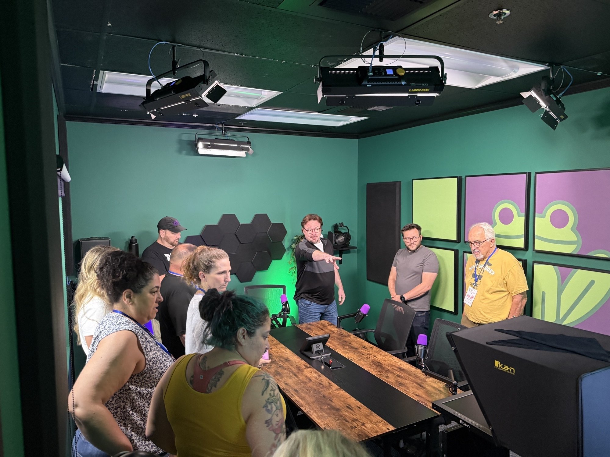 Key Code Media staff give teachers a tour of the podcast studio in Burbank