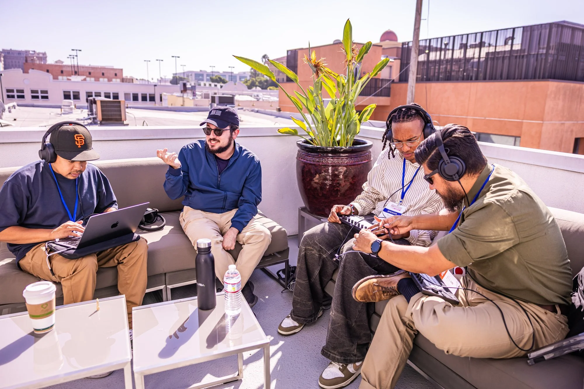 Two pairs of teachers make music with Ableton on the Ableton Spaces balcony