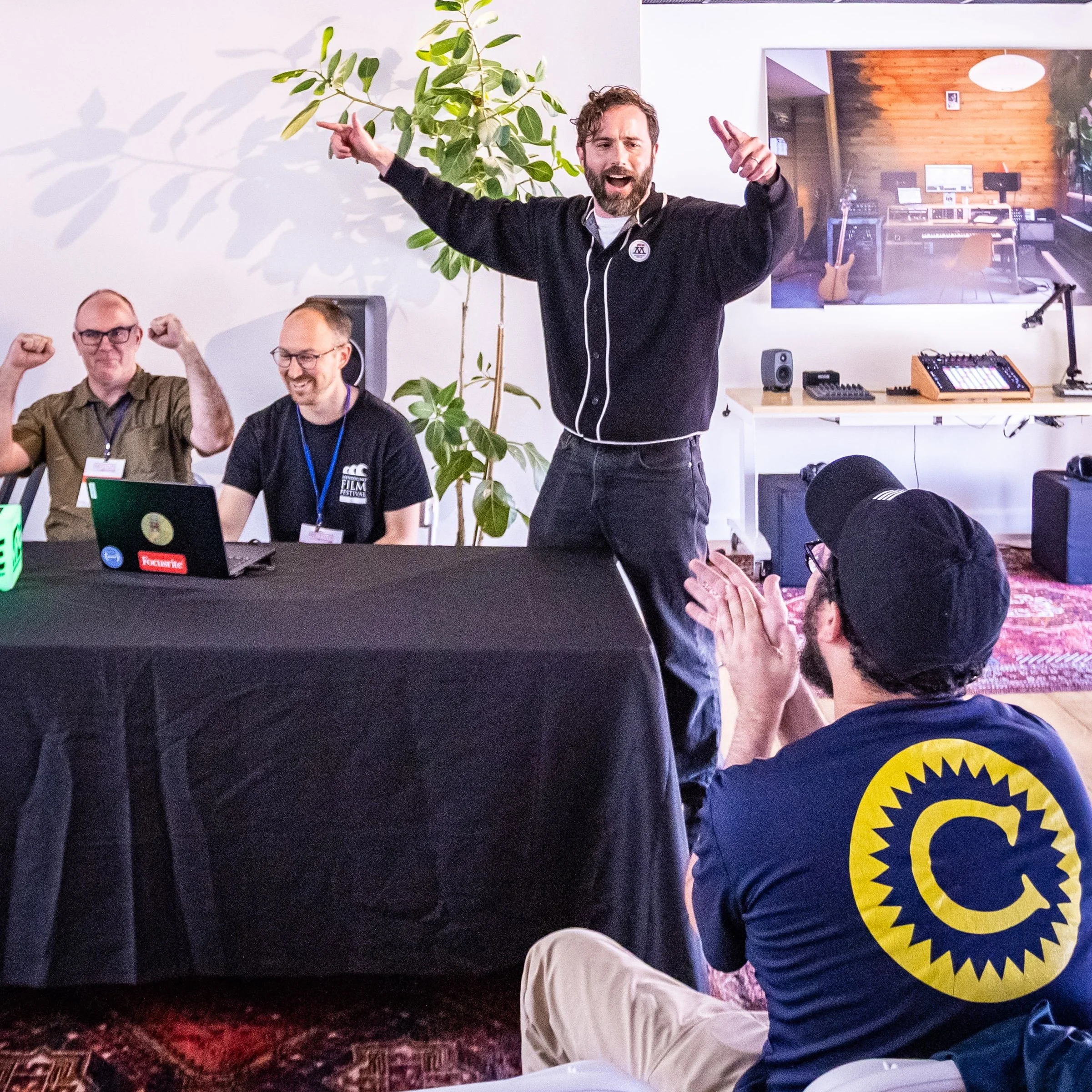 Lawrence Grey hypes up the room during the teacher listening party at Ableton Spaces