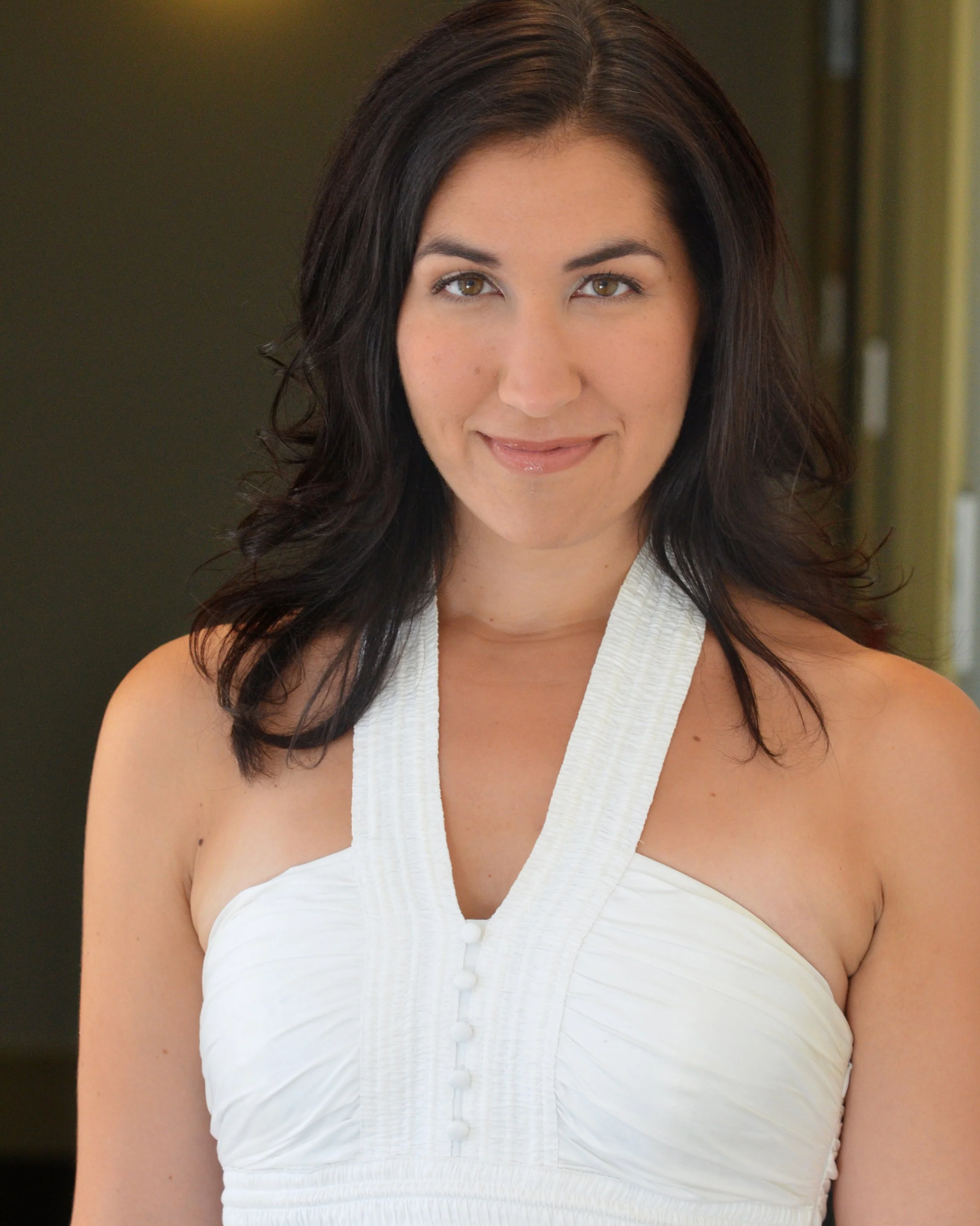 Attractive woman singer in white dress