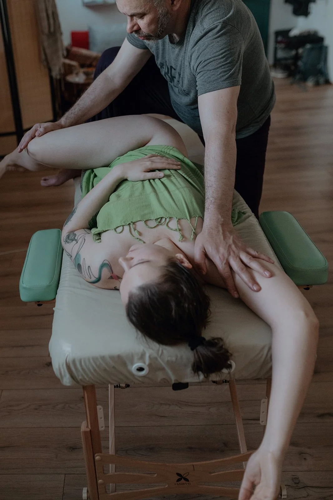 Deep hip rotation with full body stretch.