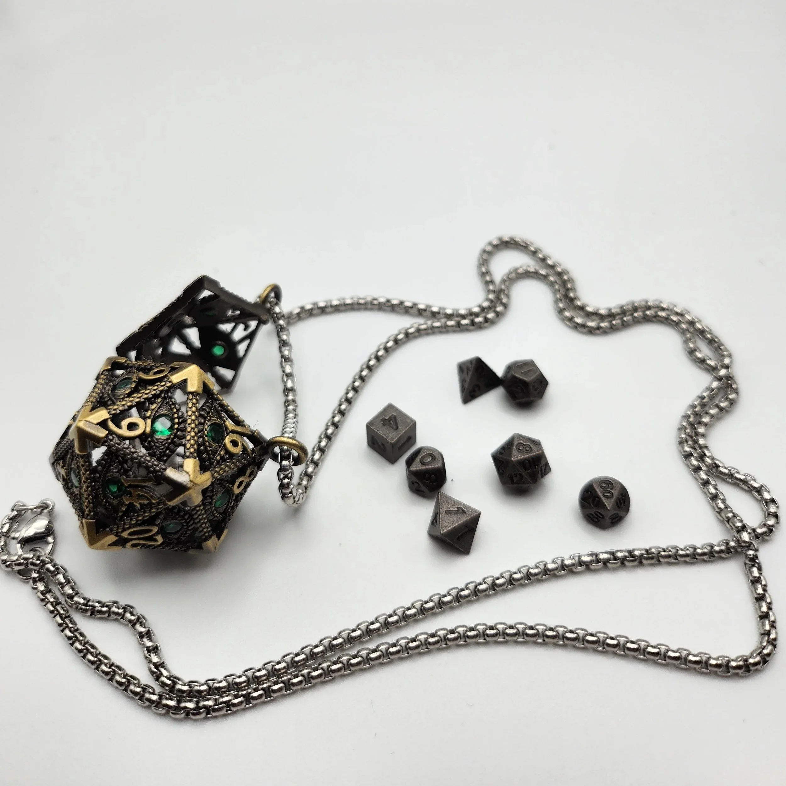 Mini+Dice%2C+D20+Gem+Eye+Necklace+-+Brass+%26+Green+Gem.jpg