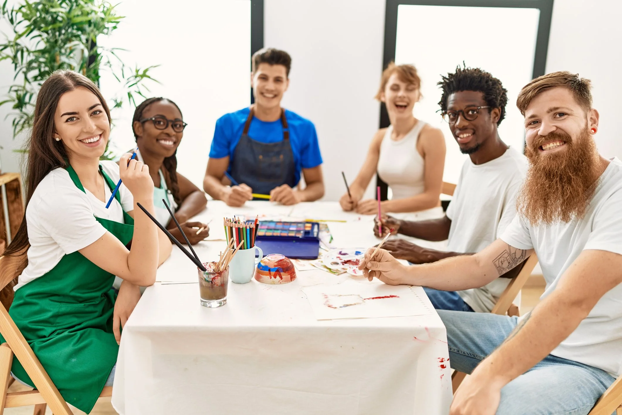 Group of young adults participating in an art activity